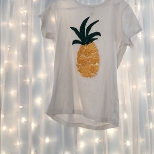 White t-shirt with pineapple on it